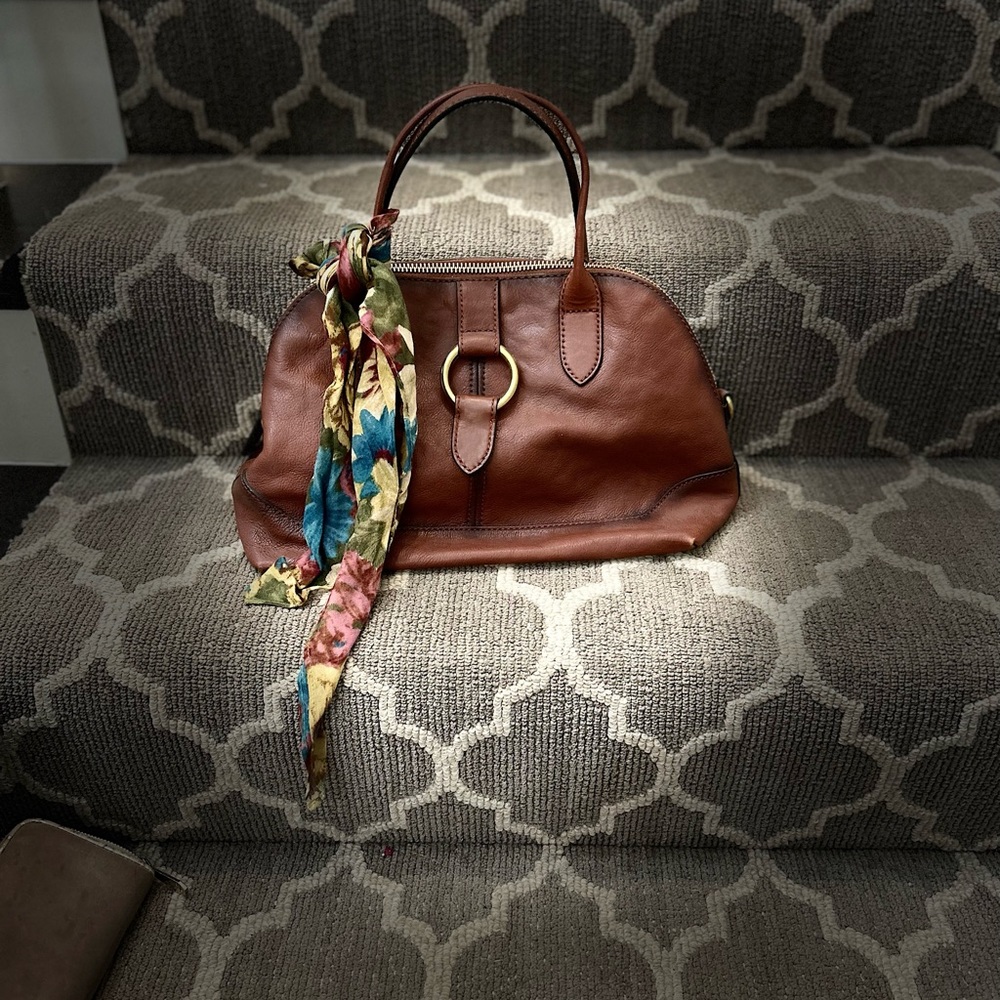 Selling this chestnut brown purse that is very versatile.